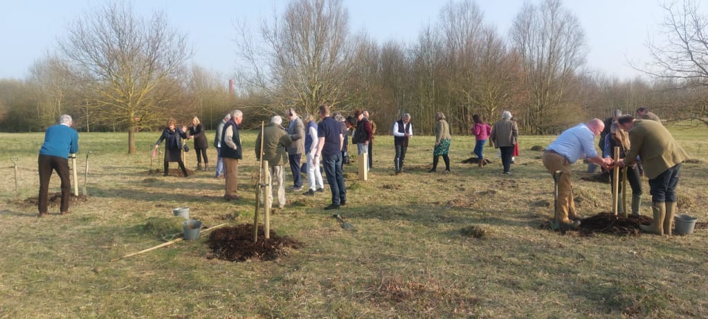 Group of people including the Lord-Lieutenant of Bedfordshire planting trees